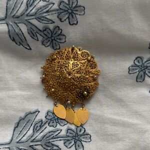 Intricate Gold Filigree Brooch with Dangling Accents